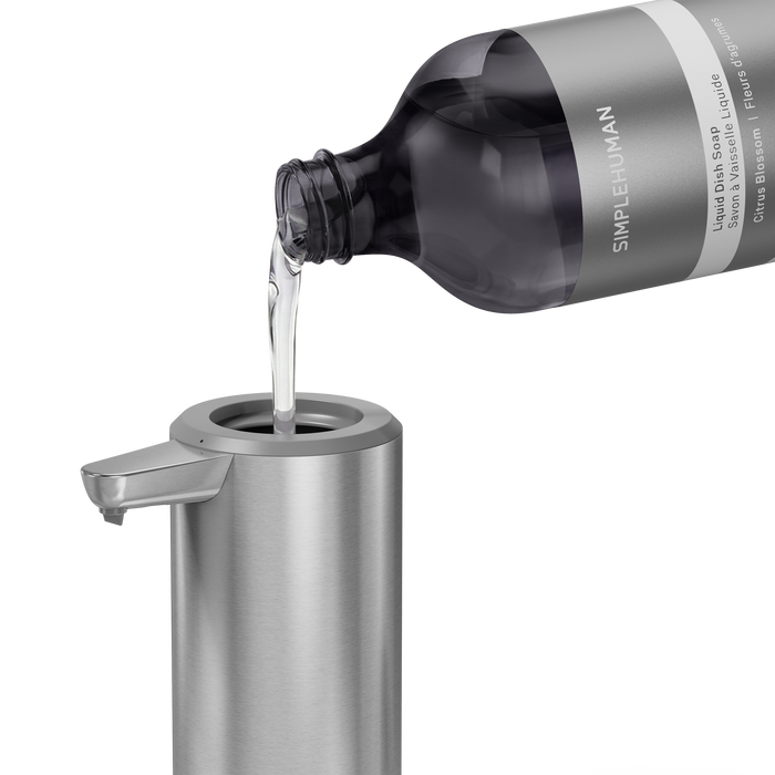 Simplehuman's Refill Bottle filling a Simplehuman Liquid Sensor Pump.
